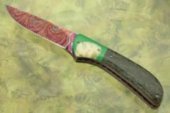 Flipper With Heat Colored Damascus, Ancient Sea Cow Bone, And Warthog Tusk