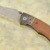 Linerlock Front Flipper With Sculpted Bronze And Micarta