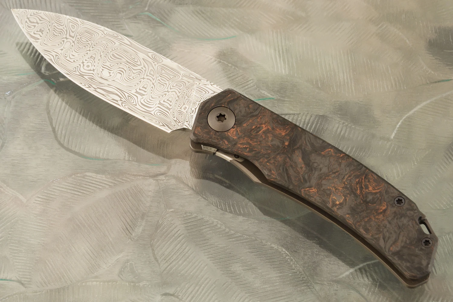 Urban SFL Framelock Front Flipper With Damascus And Copper Dark Matter FatCarbon 1 Urban SFL Framelock Front Flipper With Damascus And Copper Dark Matter FatCarbon