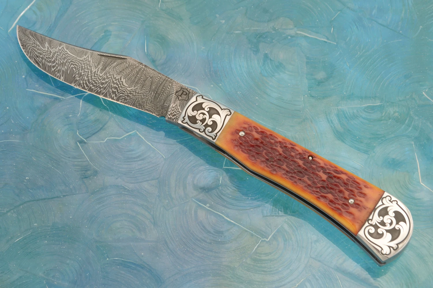 Damascus Slipjoint Trapper With Amber Jigged Bone 2 Damascus Slipjoint Trapper With Amber Jigged Bone - Image 2