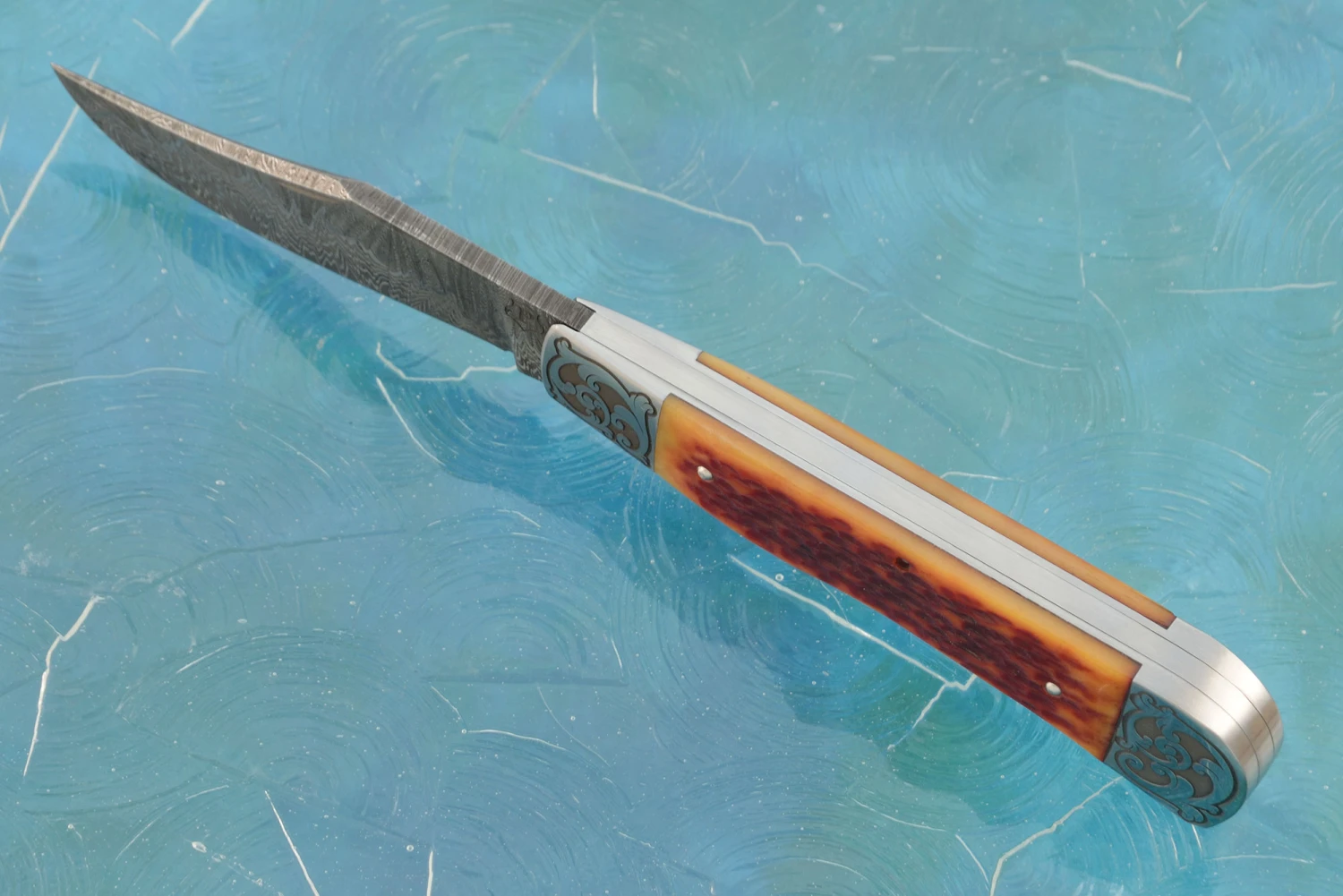 Damascus Slipjoint Trapper With Amber Jigged Bone 5 Damascus Slipjoint Trapper With Amber Jigged Bone - Image 5