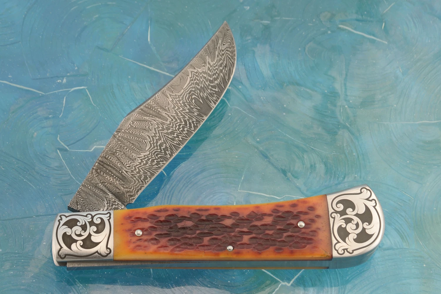 Damascus Slipjoint Trapper With Amber Jigged Bone 6 Damascus Slipjoint Trapper With Amber Jigged Bone - Image 6