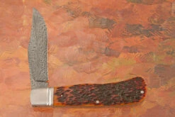 Feather Damascus Slipjoint Trapper With Amber Jigged Bone -Optimal Knives Store 106125 5 x