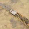 Damascus Dogleg Slipjoint With Mammoth Ivory