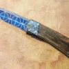 Liner Lock Folder With Blued Damascus And Mammoth Ivory