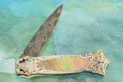 Damascus Backlock Interframe With Bulino Engraving And Blacklip Mother Of Pearl (Prototype) 11 Damascus Backlock Interframe With Bulino Engraving And Blacklip Mother Of Pearl (Prototype) -Optimal Knives Store 109118 5 x