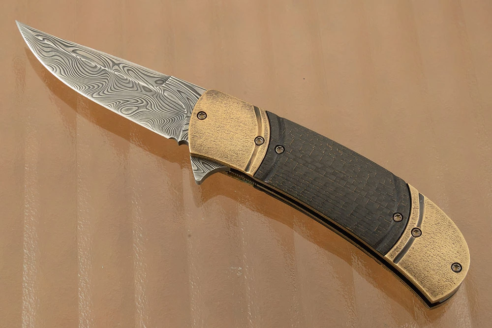 Damascus Flipper With Lightning Strike Carbon Fiber And Bronze 1 Damascus Flipper With Lightning Strike Carbon Fiber And Bronze